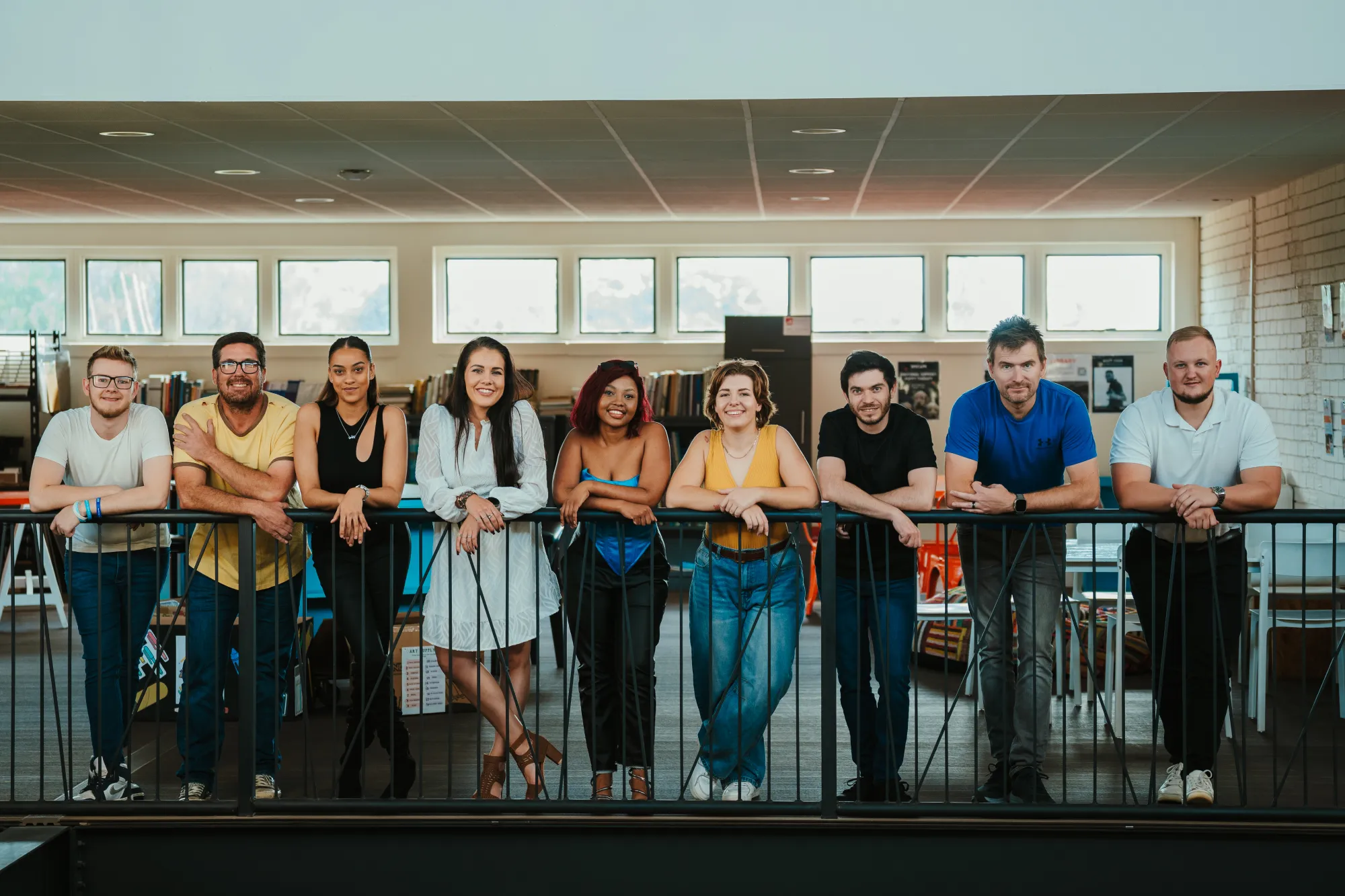 Kickass Collective digital marketing agency team smiling on balcony
